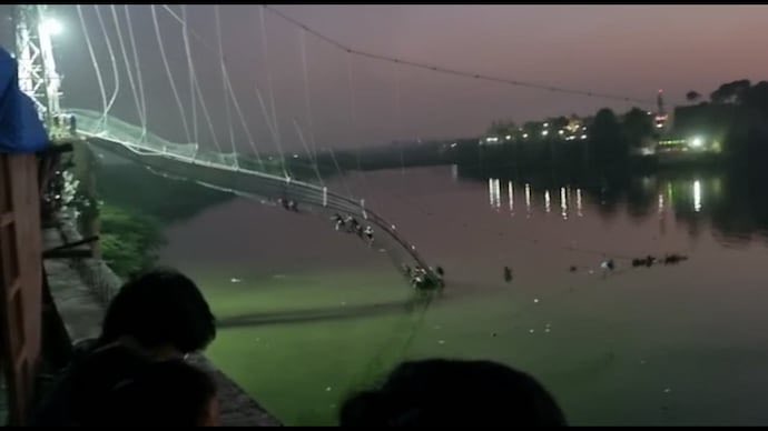 Gujarat: Morbi Cable bridge collapses, over 60 killed and more than 100 feared to be trapped in the river.