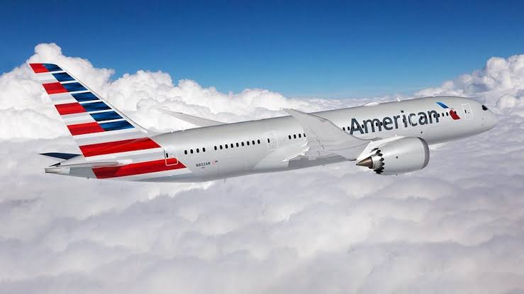 Drunk Indian student urinates on a US co-flyer on an American Airlines flight.